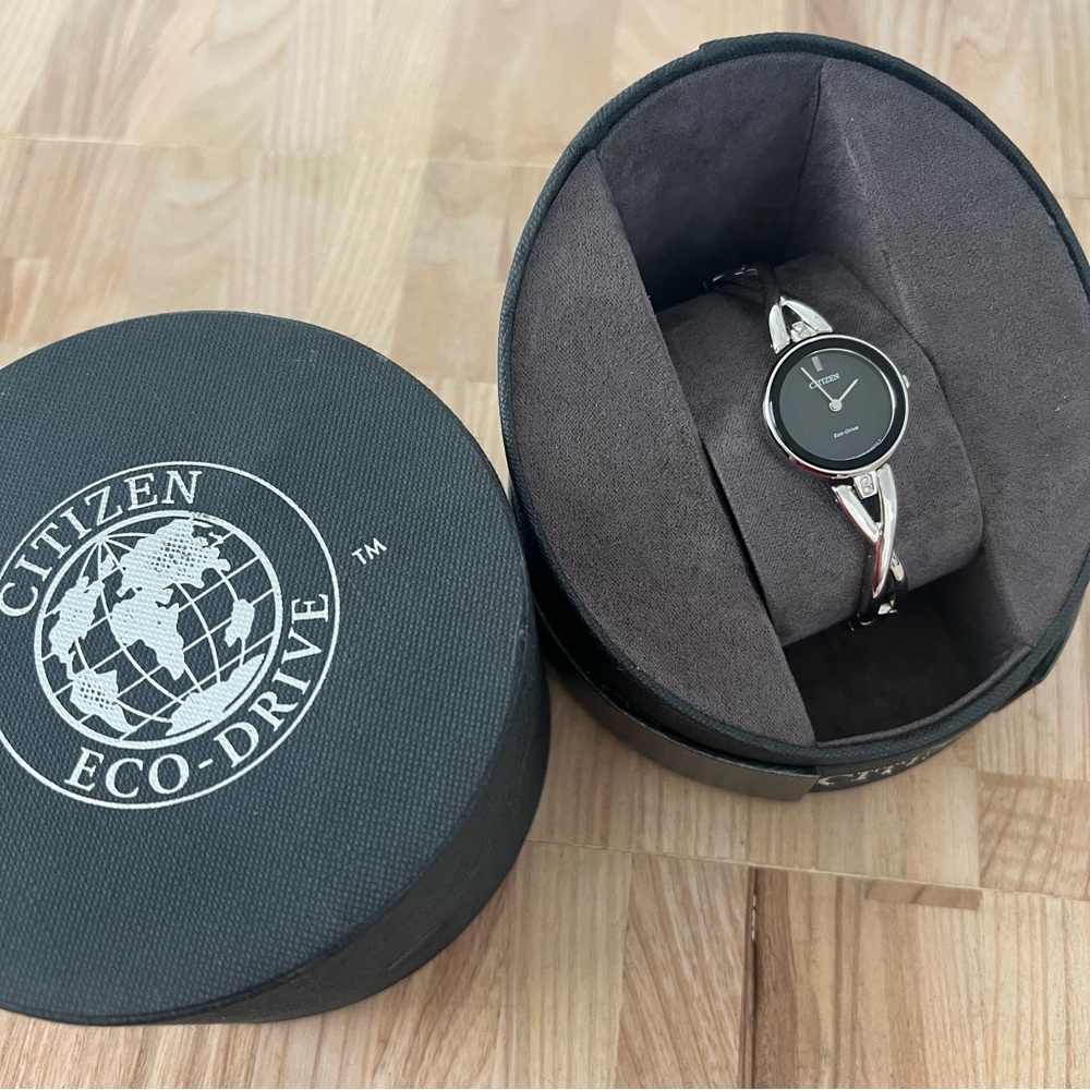 Citizen eco-drive ladies black dial silver tone solar powered dress watch